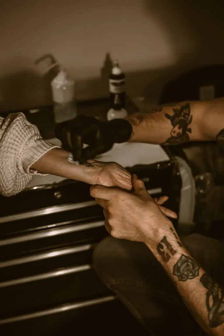 Tattoo artist working on realism piece at Essex tattoo studio