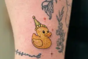 glitter tattoo of a duck