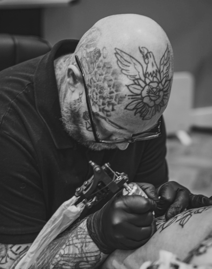 Artist working at award-winning Essex tattoo studio