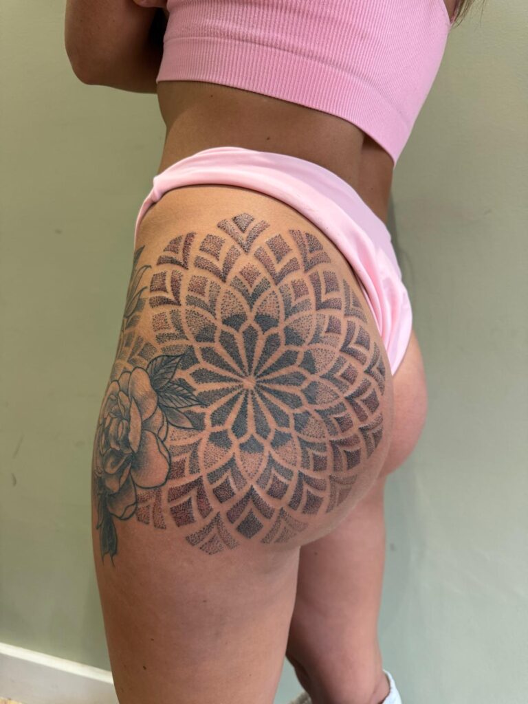 Geometric Tattoos Essex studio tattooed this mandala on the upper leg