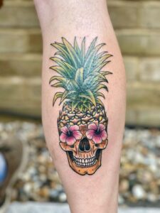 New School Tattoos design of a pineapple skull